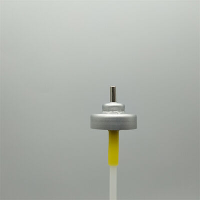 Válvula dosificadora de aerosol de precisión para la dispensación de propelente y producto en aerosoles con entrega consistente